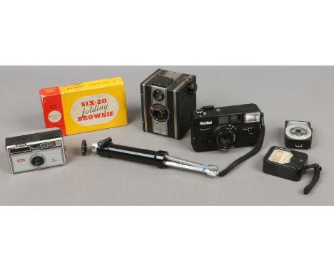 A quantity of photographic equipment including a Six-20 folding Brownie camera in original box, Kodak, light meters and a Rol