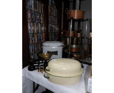 A mixed lot including scales, pan stand, copper pans, enamel bread bin and enamel roaster