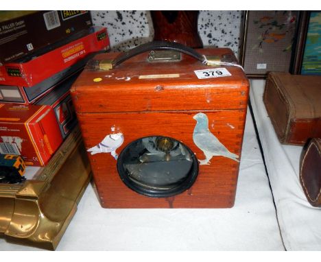 A pigeon racing clock