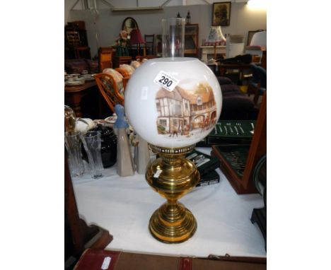 A brass based oil lamp