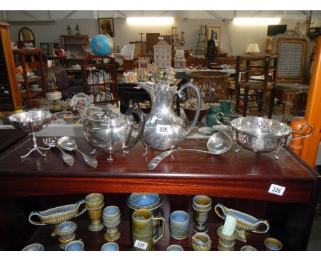 A silver plated tea pot & coffee pot, 2 silver plated bowls, a ladle & salad servers