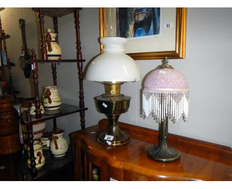 An oil lamp & table lamp