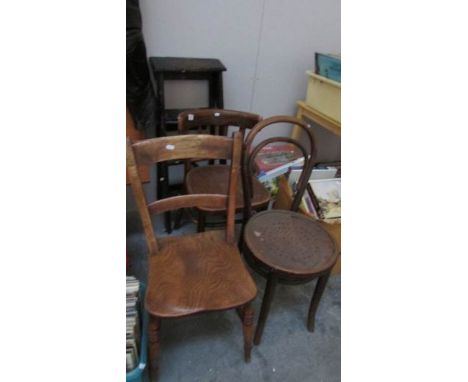 3 odd kitchen chairs and a wooden step ladder
