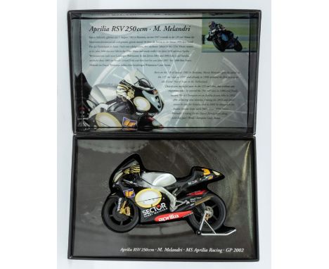 Minichamps: A 1:12 Scale Model of a Aprilia RSV 250ccm MS Aprilia Racing GP 2002 M. Melandri, Manufacturer Minichamps. Boxed.