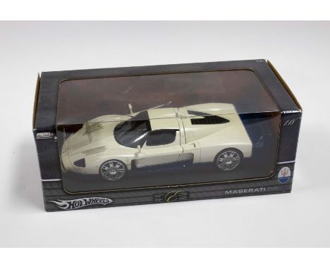 Hot Wheels: A 1:18 Scale Model of a Maserati MC12, Manufacturer Hot Wheels. Boxed. Reference No. G7158. Contents appear in a 