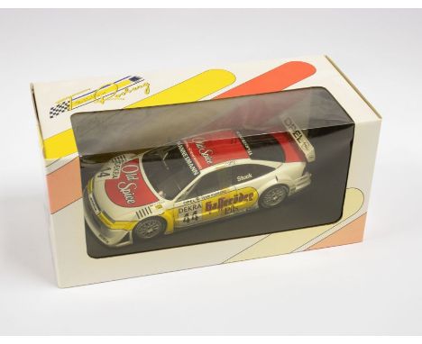 UT Models: A 1:18 Scale Model of a Opel Calibra V6 4 x 4 DTM 1996 Team Rosberg H.J. Stuck #46, Manufacturer UT Models. Boxed.