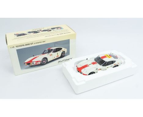 Autoart: A 1:18 Scale Model of a Toyota 2000 GT 24 HRS Fuji 1967 #1, Manufacturer Autoart. Boxed. Reference No. 86715. Conten