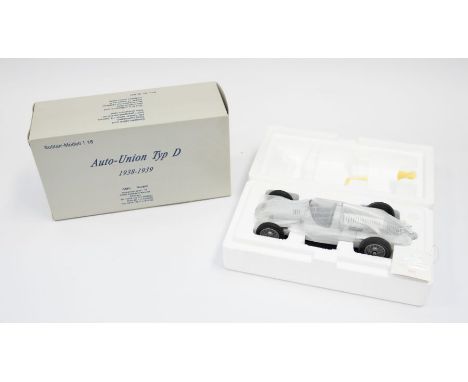 CMC: A 1:18 Scale Model of a Auto-Union Typ D 1938-1939, Manufacturer CMC Exclusive Modelle. Boxed. Reference No. M-027. Cont
