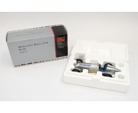 CMC: A 1:18 Scale Model of a Mercedes Benz 1934 W 25, Manufacturer CMC Exclusive Modelle. Boxed. Reference No. M-033. Content