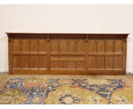 Large late 19th century ecclesiastical Gothic pitch pine wall panel, 317cm x 110cm