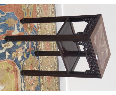 Chinese hardwood two tier occasional table, inset red marble top, pierced scroll carved moulds, reed moulded supports and fra