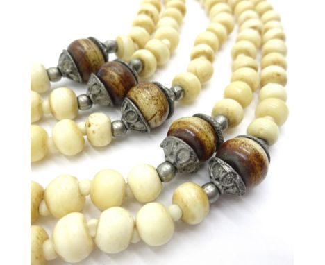 Early 20th century ivory bead necklace and bangle