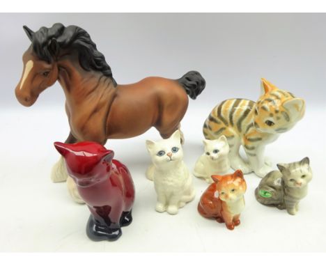 Royal Doulton Flambe model of a seated cat, Beswick cantering shire horse, Beswick and other cat models (7)