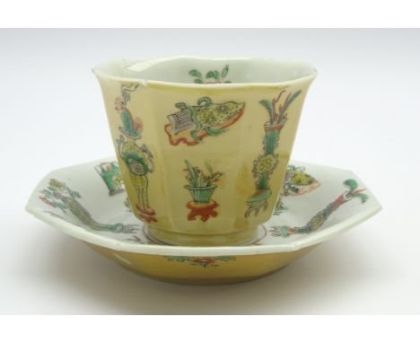 Chinese Kangxi famille verte tea bowl and saucer of panel sided design painted with vases and scholarly objects.  Provenance: