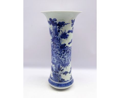 Japanese Arita beaker vase, Edo period, late 17th Century, with flared neck, decorated with bamboo and pine trees in tones of
