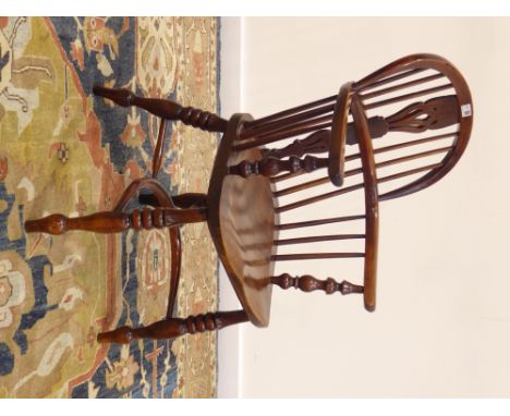 19th century yew wood low stick and pierced splat back Windsor armchair, turned supports with crinoline stretcher, W55cm Cond