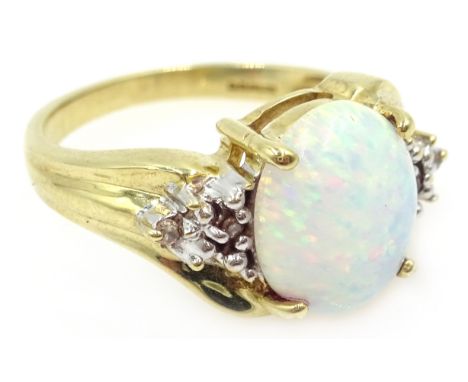 Opal and diamond gold ring, hallmarked 9ct  Condition Report &amp; Further Details Size M-N, approx 3.4gm