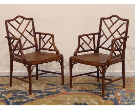 Pair Chinese Chippendale style simulated bamboo armchairs, stained beech framed with dished seats