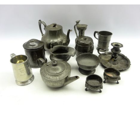 Group of 19th century and later pewter including a barrel shaped tobacco jar, another tobacco jar, 1/2 pint measure, teapot, 