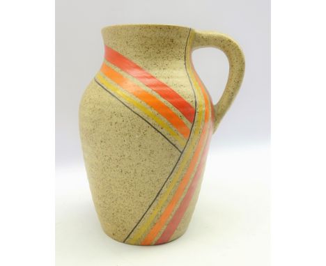 Clarice Cliff Bizarre Lotus jug decorated in the Goldstone pattern, H24.5cm  Condition Report & Further Details Paint a littl
