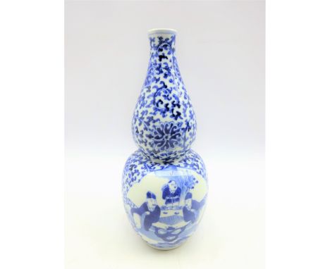 19th Century Chinese vase of baluster and flask design decorated in blue and white with panels of figures within a scroll and