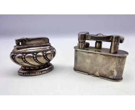 Dunhill plated table lighter with engine turned body Design no. 737418 and patent no. 390107 and a Ronson Crown table lighter