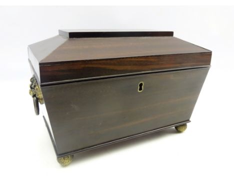 19th century Anglo-Indian coromandel wood tea caddy, the interior with 3 covered containers, sarcophagus top, lion mask handl
