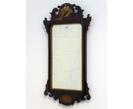 20th century mahogany Chippendale style mirror with carved gilt eagle pediment and inlaid shell motif, bevelled glass plate, 