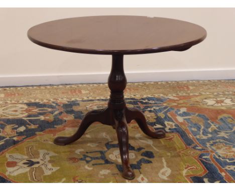 19th century mahogany tripod table, circular tilt top, turned vase shaped column, three flower head carved splayed legs with 