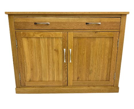 Contemporary light oak sideboard desk, rectangular top with full length drawer, hinged front panel revealing pull-out keyboar