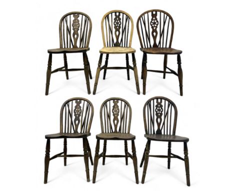 Mid-to-late 20th century set of six elm and beech Windsor dining chairs, hoop and stick back with pierced wheel splat, dished