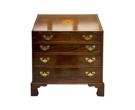 Mid-to-late 20th century inlaid mahogany bureau, inlaid floral medallion to the top, the fall front opening to reveal fitted 