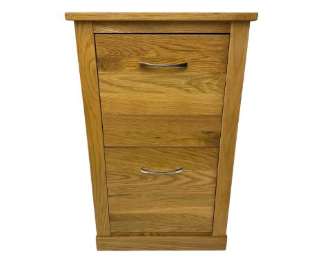 Contemporary light oak filing cabinet, rectangular top over two drawers each fitted with metal rods, on plinth baseDimensions