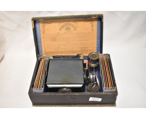 The Standard EP magic lantern by Ernst Plank in original wooden box with lens, burner and slides