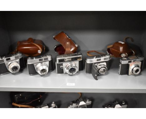 Four Kodak and one Agfa camera. A Kodak Colorsnap35, a Retinette 1A, a Retina IIC and a Retina IIIS with and Agfa Silette LK