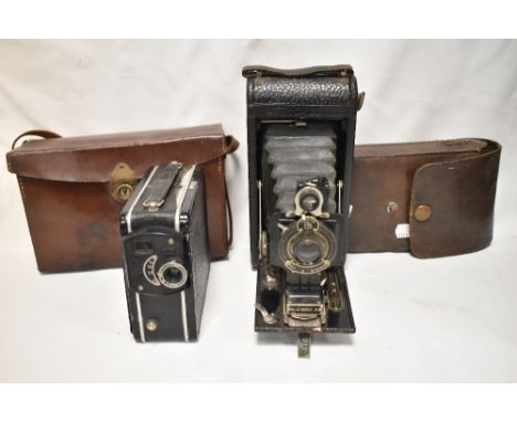 A coronet cine camera and a Kodak 1A folding camera