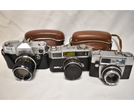 Three cameras. A Taron VL camera with Taronar 1:2,8 45 mm lens, a Mamiya no model number (spares and repairs) having Mamiya S