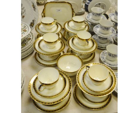 A Crescent ware service for twelve, consisting of tea cups, saucers, side plates, slop bowl; etc qty