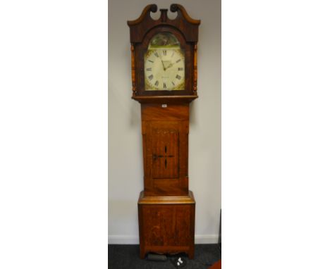 A George III longcase clock, swan neck finials terminating in turned circular detail above turned pilasters enclosing hand pa