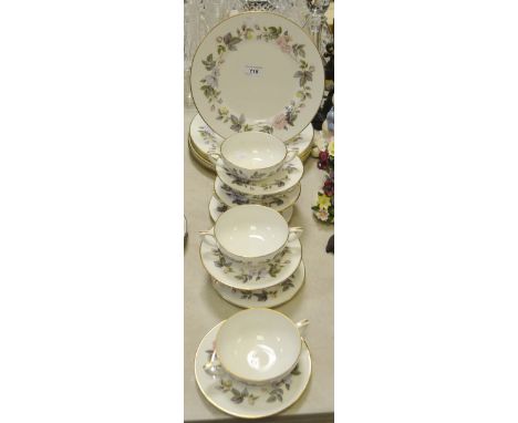 A set of 6 Royal Worcester June Garland dinner plates; similar soup bowls and stands.