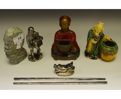 A Chinese  chopstick rest and chopsticks;  a base metal figure of a Chinese man;  a spill vase holder;  etc 