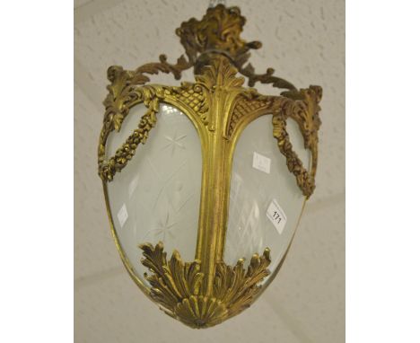 Lighting - an early 20th Century gilt metal ceiling light, three panelled frosted glass, etched with stars 