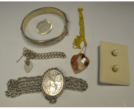 A silver hinged bangle;  a silver locket;  Cornwall pearl studs;  etc 