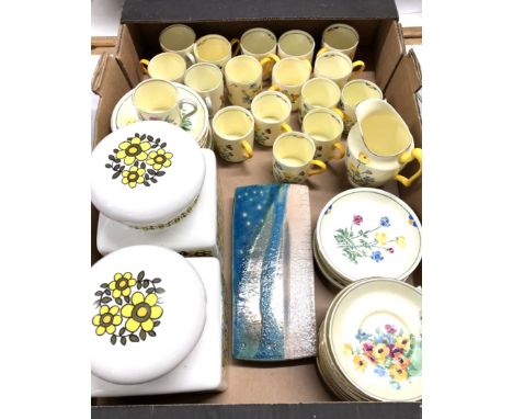 A Crown Staffordshire Art Deco part coffee service, decorated flowers, a pair of 1970s storage jars, and a ceramic plaque (bo