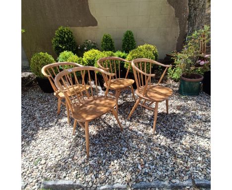 A set of four Ercol light elm armchairs (4) 