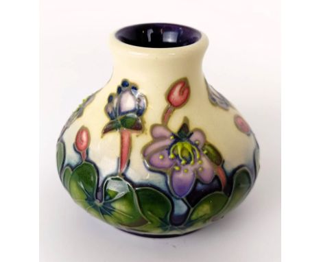 A miniature Moorcroft vase, decorated flowers, 8 cm high, two others, and a novelty bottle stop, with a butterfly finial (4) 
