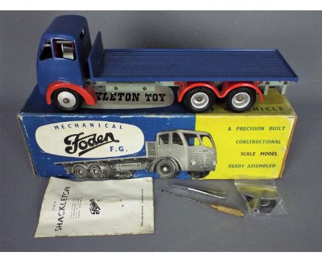 Shackleton - A boxed Shackleton Foden FG Flatbed Truck. The untested model with blue cab and back, red wheel arches and light