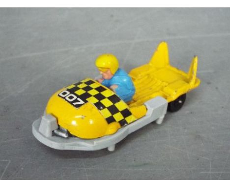Corgi Juniors, James Bond OHMSS - An unboxed Corgi Juniors "James Bond" 1011 "007" Bobsleigh from "On Her Majesty's Secret Se