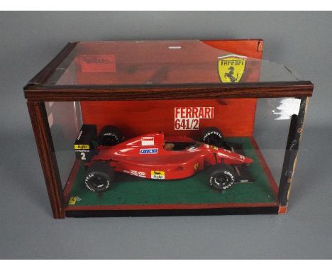 Tamiya - A built vintage 1:12 'Big Scale Series' plastic model kit #25 by Tamiya of a Ferrari 641/2 F1 racing car. The kit wh