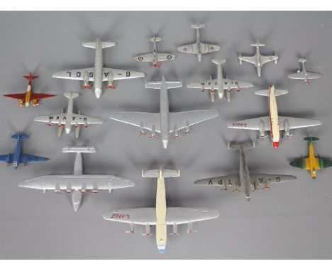 Dinky Toys - A group of 15 unboxed Dinky Aircraft. Lot includes Dinky Toys 62r Four Engined Liner (G-ATPV) in grey with four 